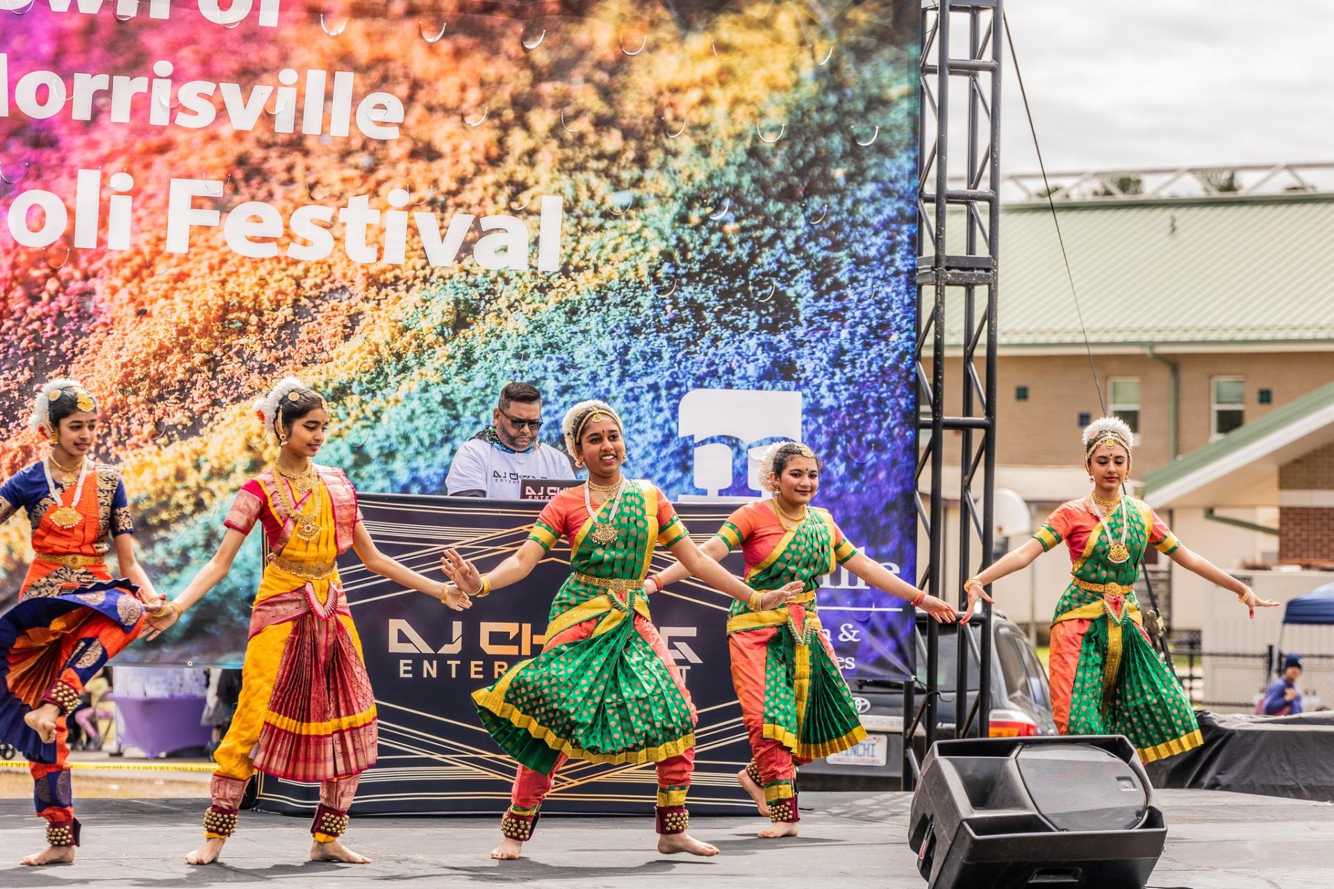 performers dance at the Holi festival